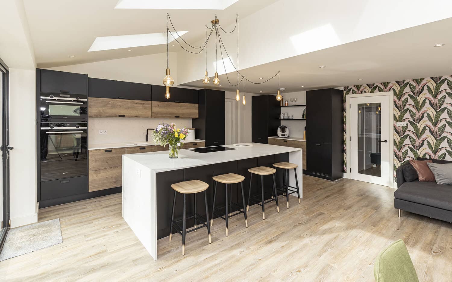 modern black and wood tone kitchen